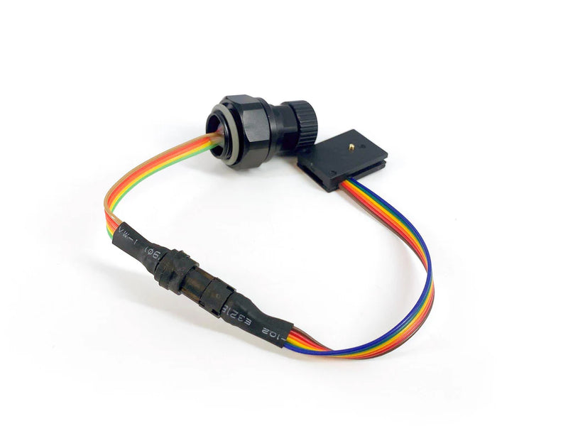 Nauticam Canon Hotshoe plug to a M14 Nikonos Bulkhead (x and ground connection only)